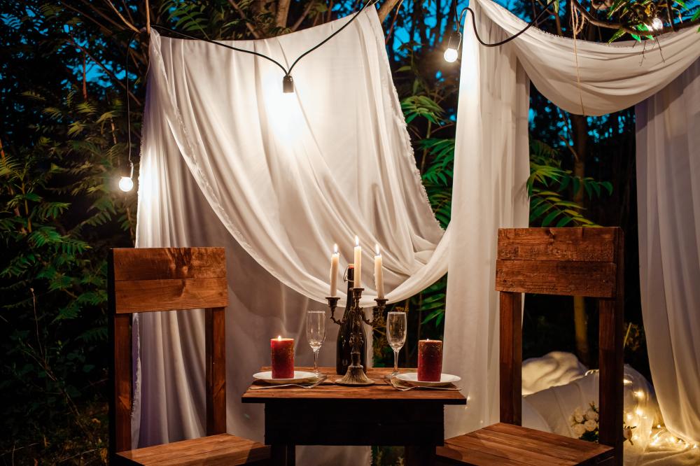 Intimate candlelit dinner in a quiet natural setting